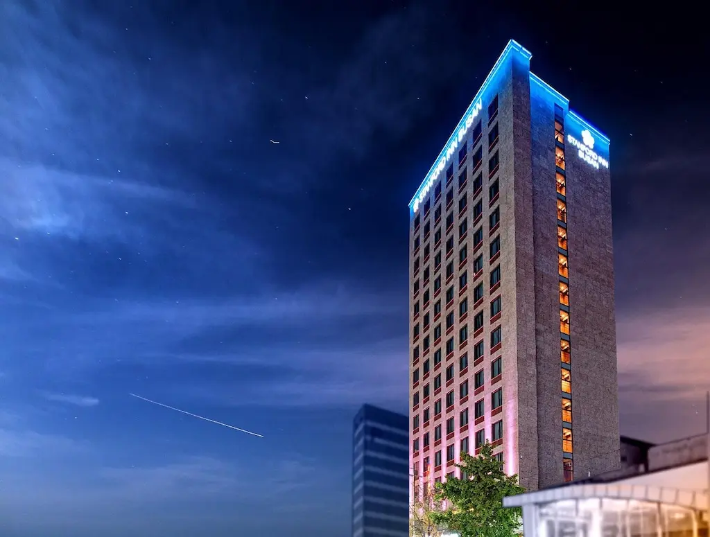 The property lit up at night